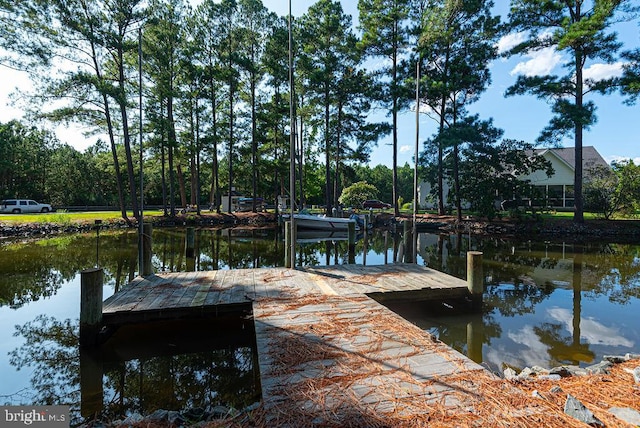 view of dock with a water view