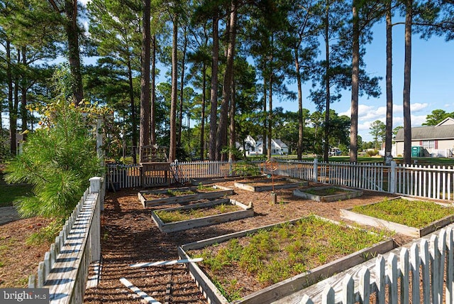 view of yard featuring a garden and fence