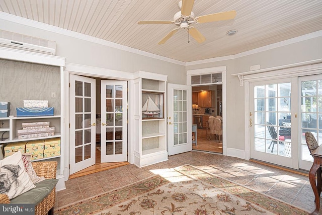 sunroom / solarium with a wall mounted AC, wood ceiling, a ceiling fan, and french doors