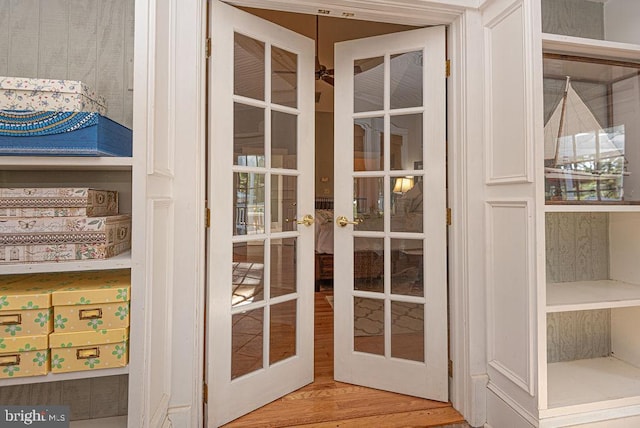 entryway with french doors and wood finished floors