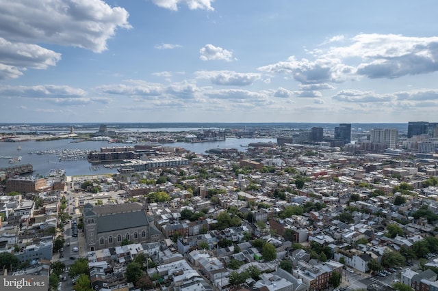 aerial view featuring a water view and a city view