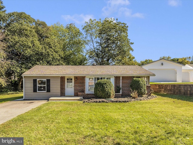 single story home featuring brick siding and a front yard