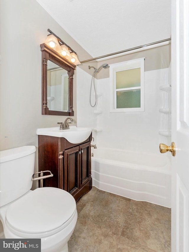 bathroom with bathing tub / shower combination, vanity, and toilet