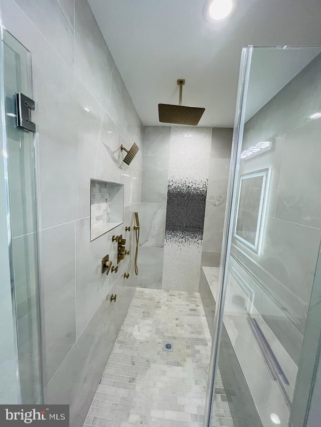 full bathroom featuring a shower stall