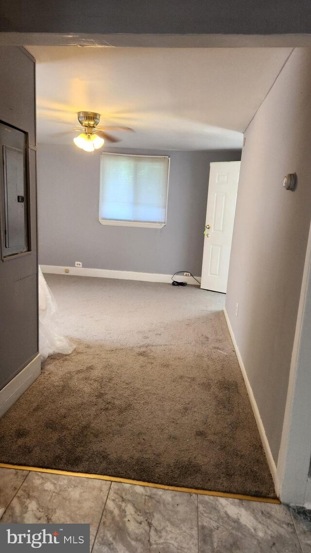 spare room featuring ceiling fan