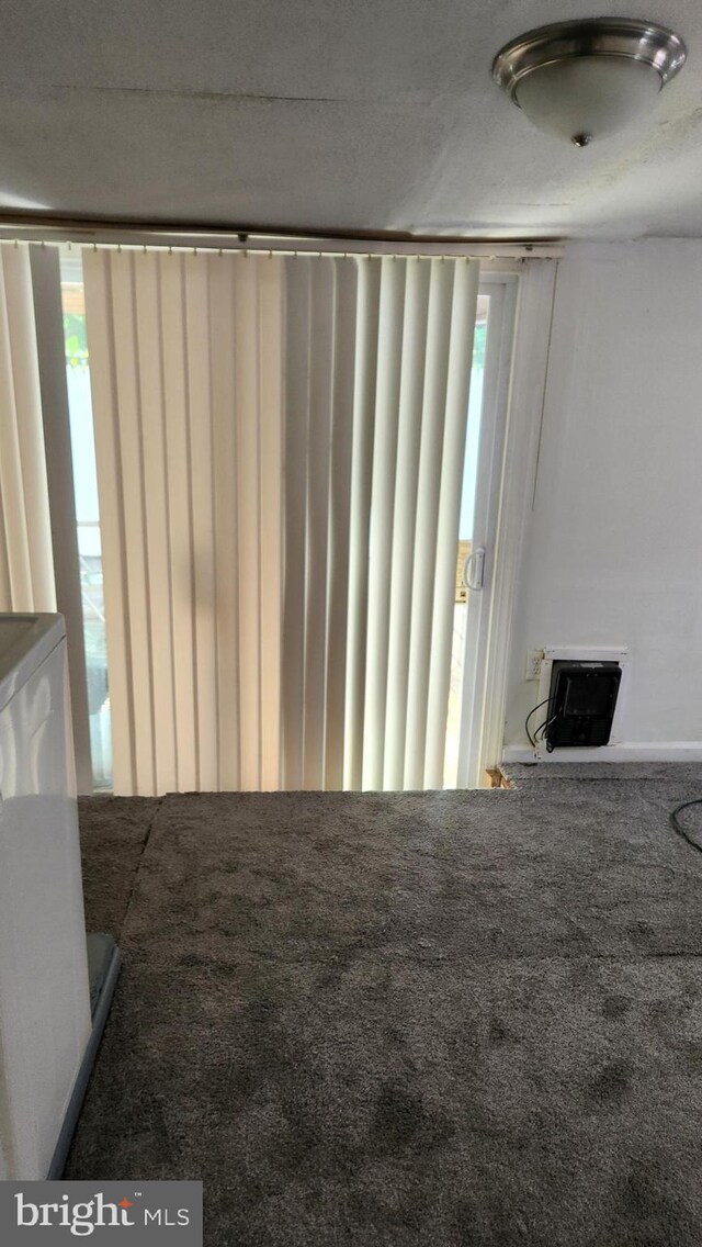 unfurnished bedroom featuring carpet flooring