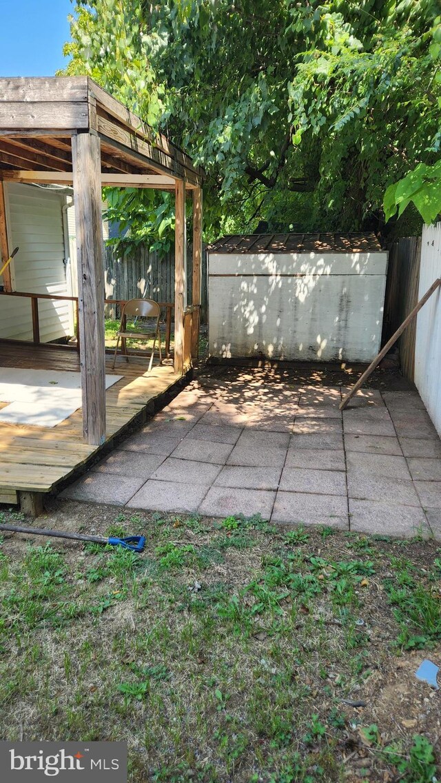 view of yard featuring a wooden deck