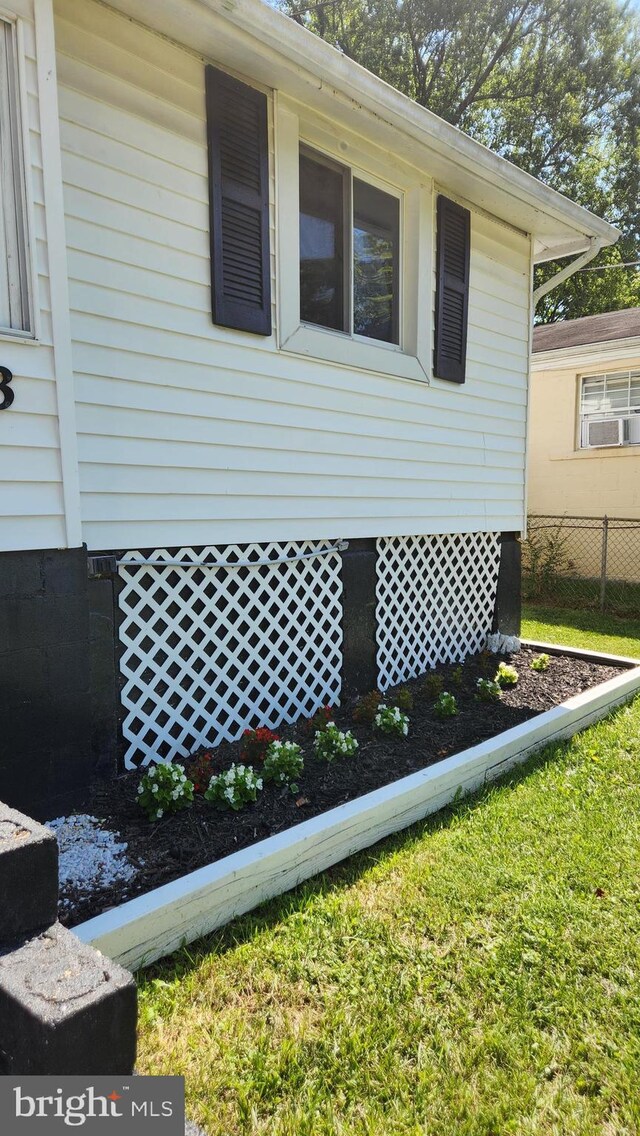 view of home's exterior featuring a yard