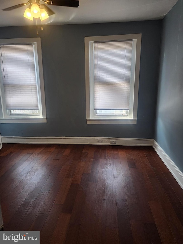 unfurnished room featuring ceiling fan and wood-type flooring