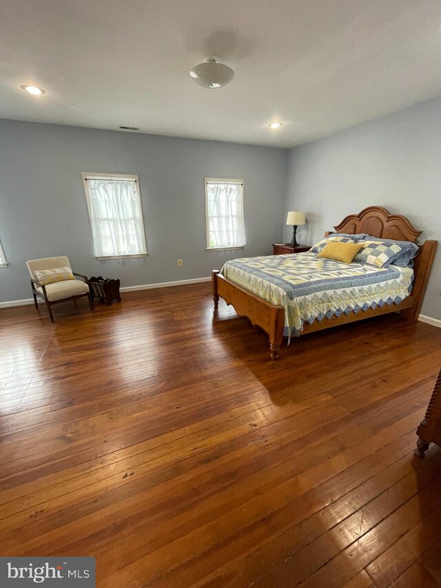 bedroom with wood-type flooring