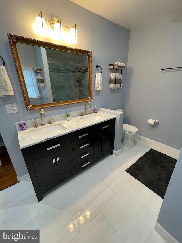 bathroom featuring double vanity and tile patterned floors