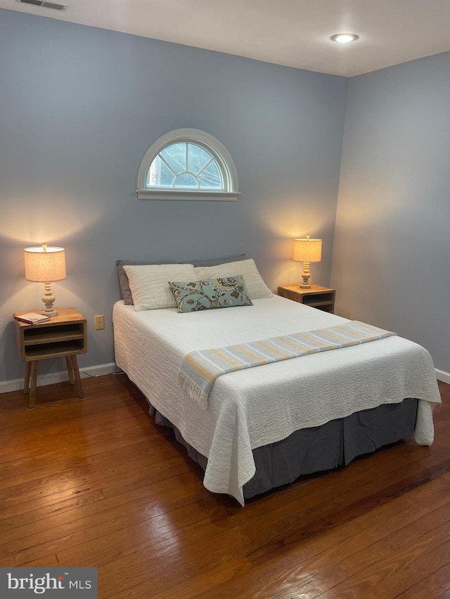 bedroom featuring hardwood / wood-style floors