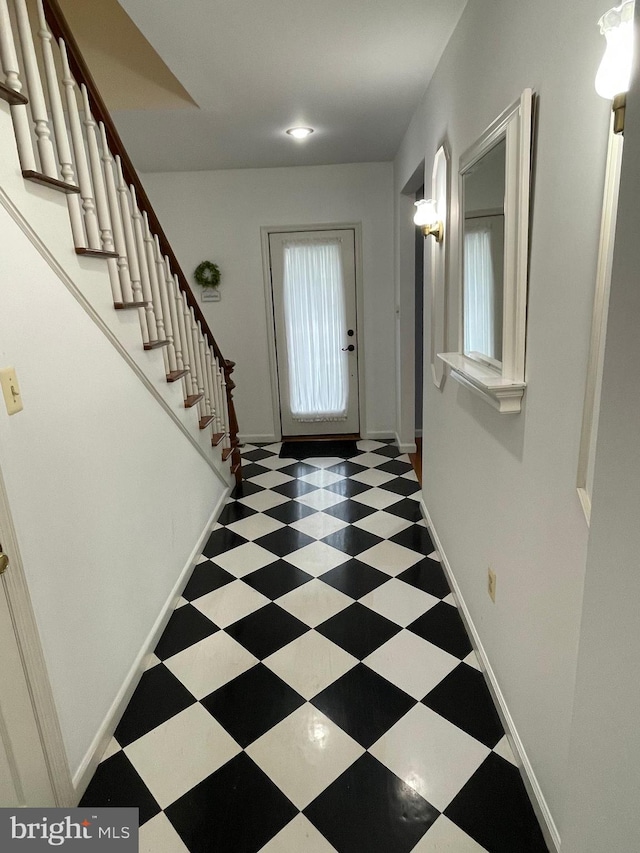 interior space with tile patterned floors