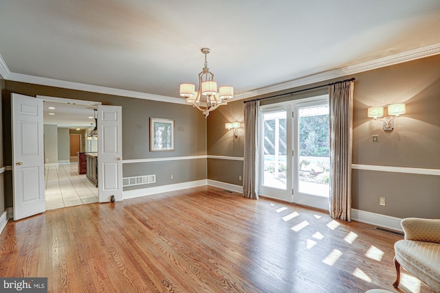 unfurnished dining area with light wood finished floors, baseboards, and visible vents