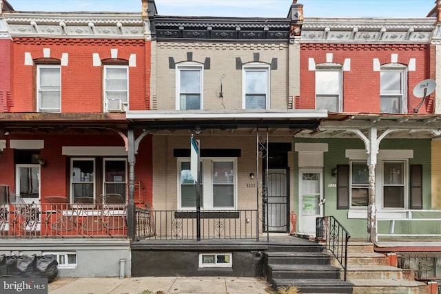 multi unit property featuring a porch