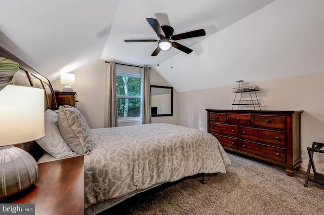 bedroom featuring ceiling fan, light colored carpet, and vaulted ceiling