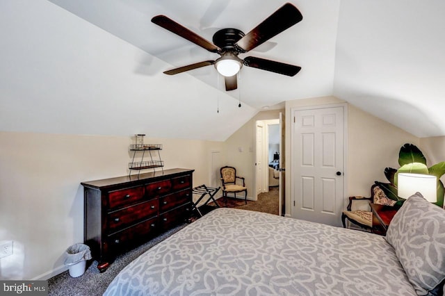 bedroom featuring ceiling fan, dark carpet, and lofted ceiling