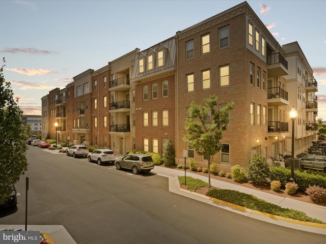 view of property at dusk