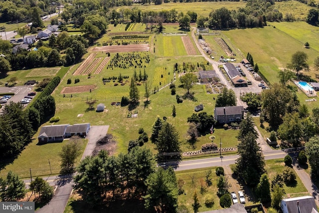 birds eye view of property featuring a rural view