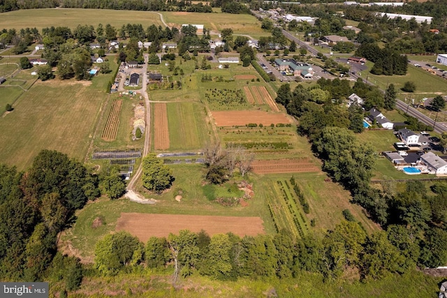 birds eye view of property featuring a rural view