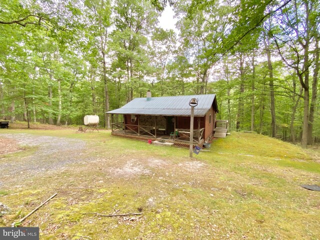 exterior space featuring an outdoor structure