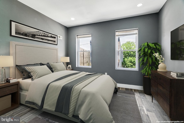 bedroom with light wood-type flooring