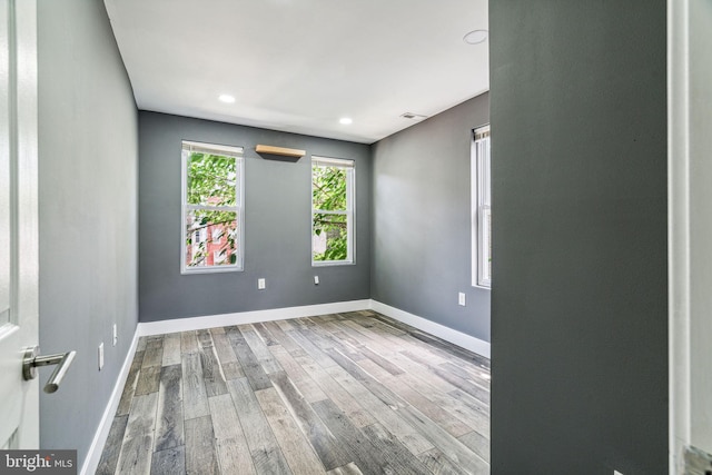 empty room featuring wood-type flooring