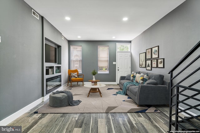 living room featuring wood-type flooring