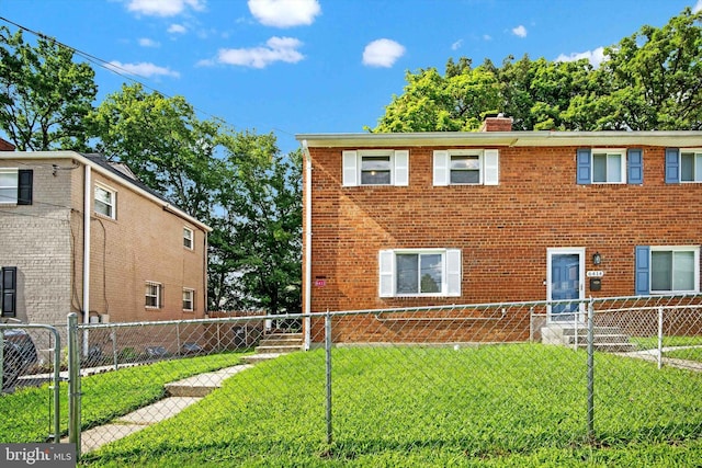 view of front of house with a front lawn