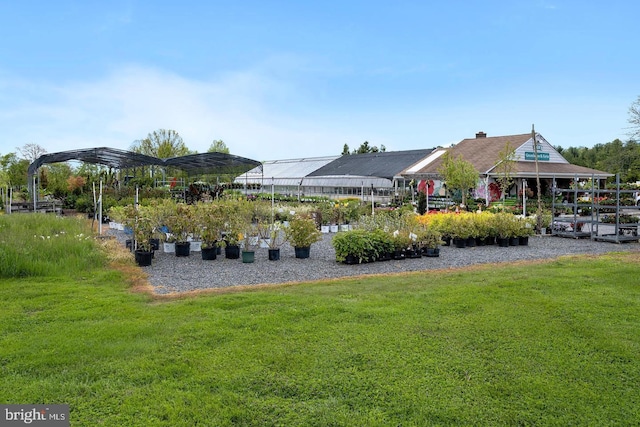 exterior space with a gazebo and a yard