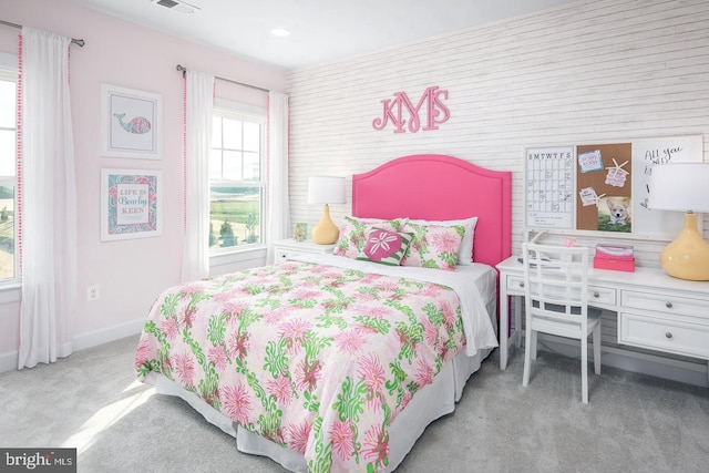 bedroom with light colored carpet