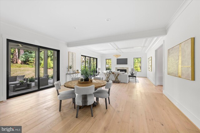 dining area with beamed ceiling, light hardwood / wood-style flooring, a chandelier, coffered ceiling, and crown molding