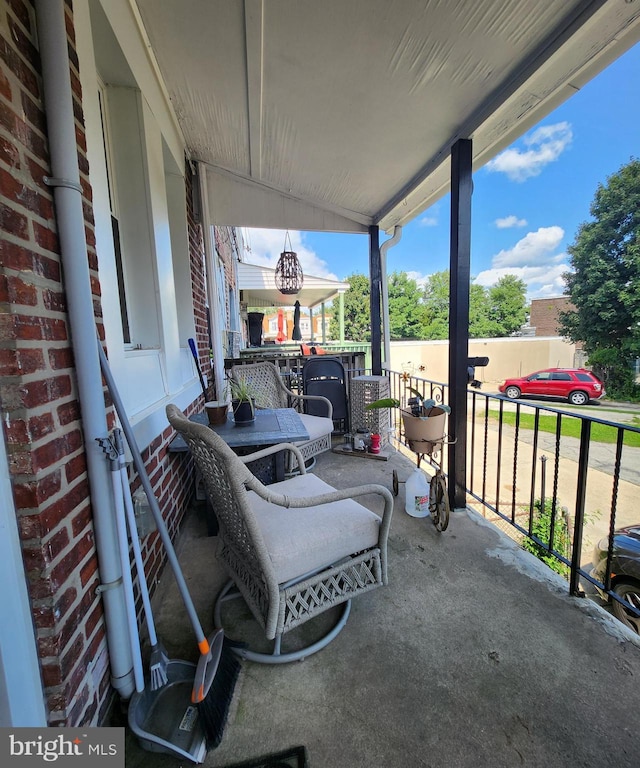 view of patio with a balcony