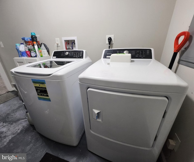 laundry area featuring washing machine and dryer