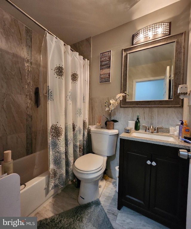 full bathroom featuring vanity, toilet, shower / tub combo with curtain, and tile walls