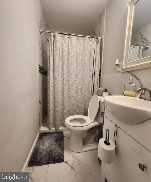 bathroom with vanity, toilet, and a shower with curtain