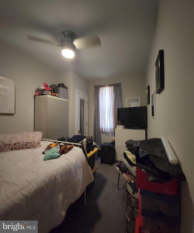 bedroom with ceiling fan and carpet flooring