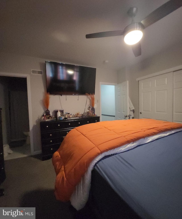 bedroom featuring ceiling fan and carpet floors