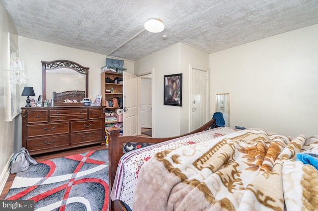 bedroom featuring hardwood / wood-style floors