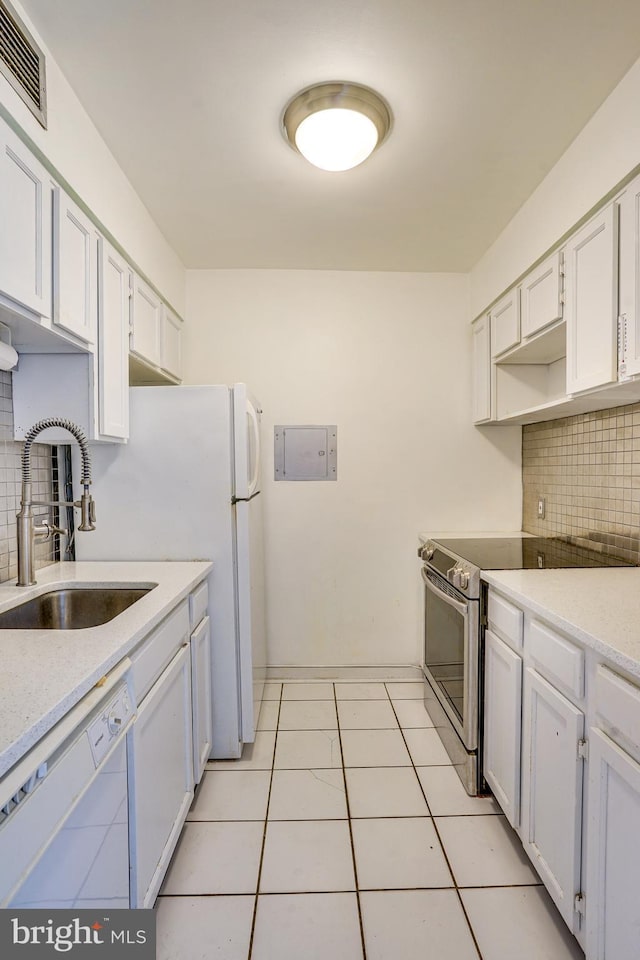 kitchen with sink, stainless steel electric range, backsplash, and dishwasher