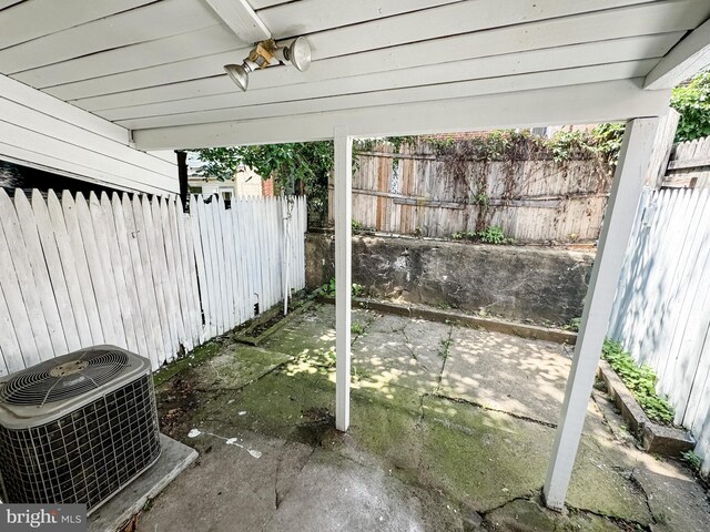 view of patio with central AC unit