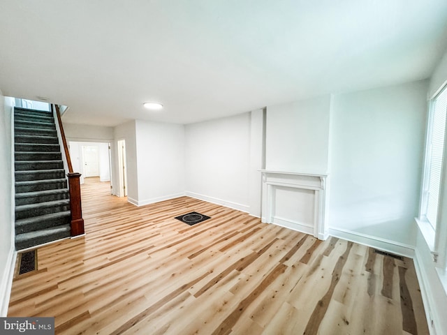 basement with light wood-type flooring