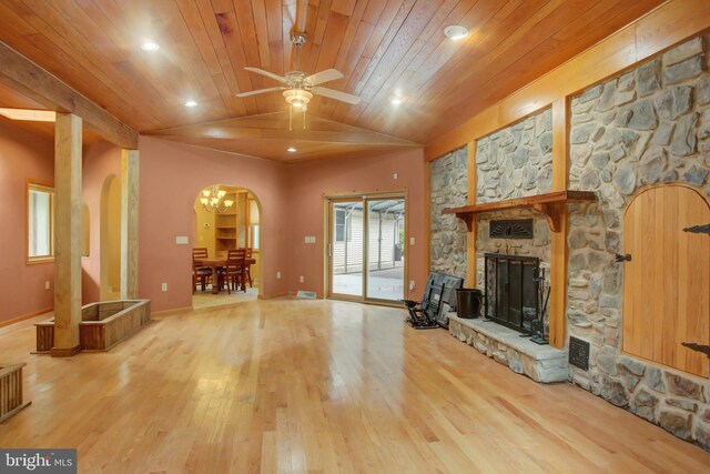 unfurnished living room featuring ceiling fan, light wood-type flooring, wood ceiling, lofted ceiling, and a fireplace