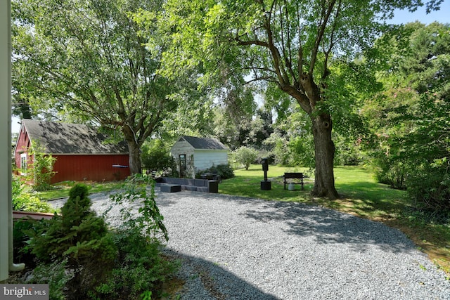 view of street featuring driveway