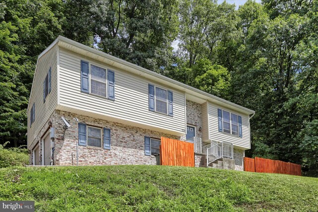 bi-level home featuring a garage