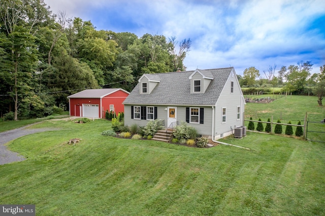 cape cod house featuring an outdoor structure, a garage, central AC unit, and a front lawn