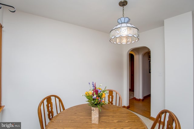 dining area with light hardwood / wood-style floors