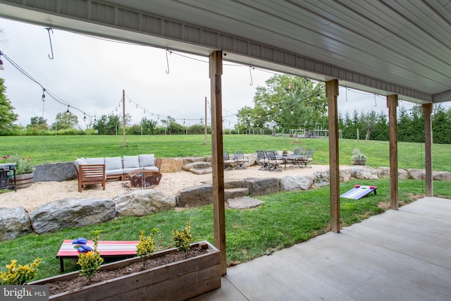 view of yard featuring a patio area and outdoor lounge area