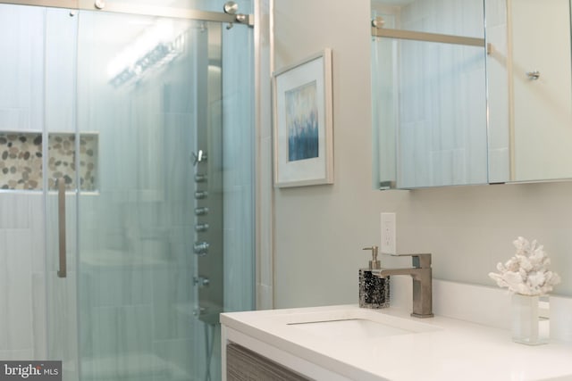 bathroom featuring vanity and walk in shower