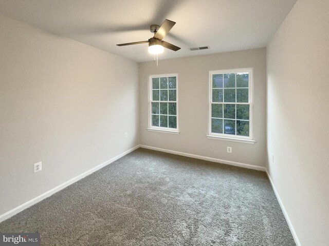 unfurnished living room with a high end fireplace and hardwood / wood-style flooring